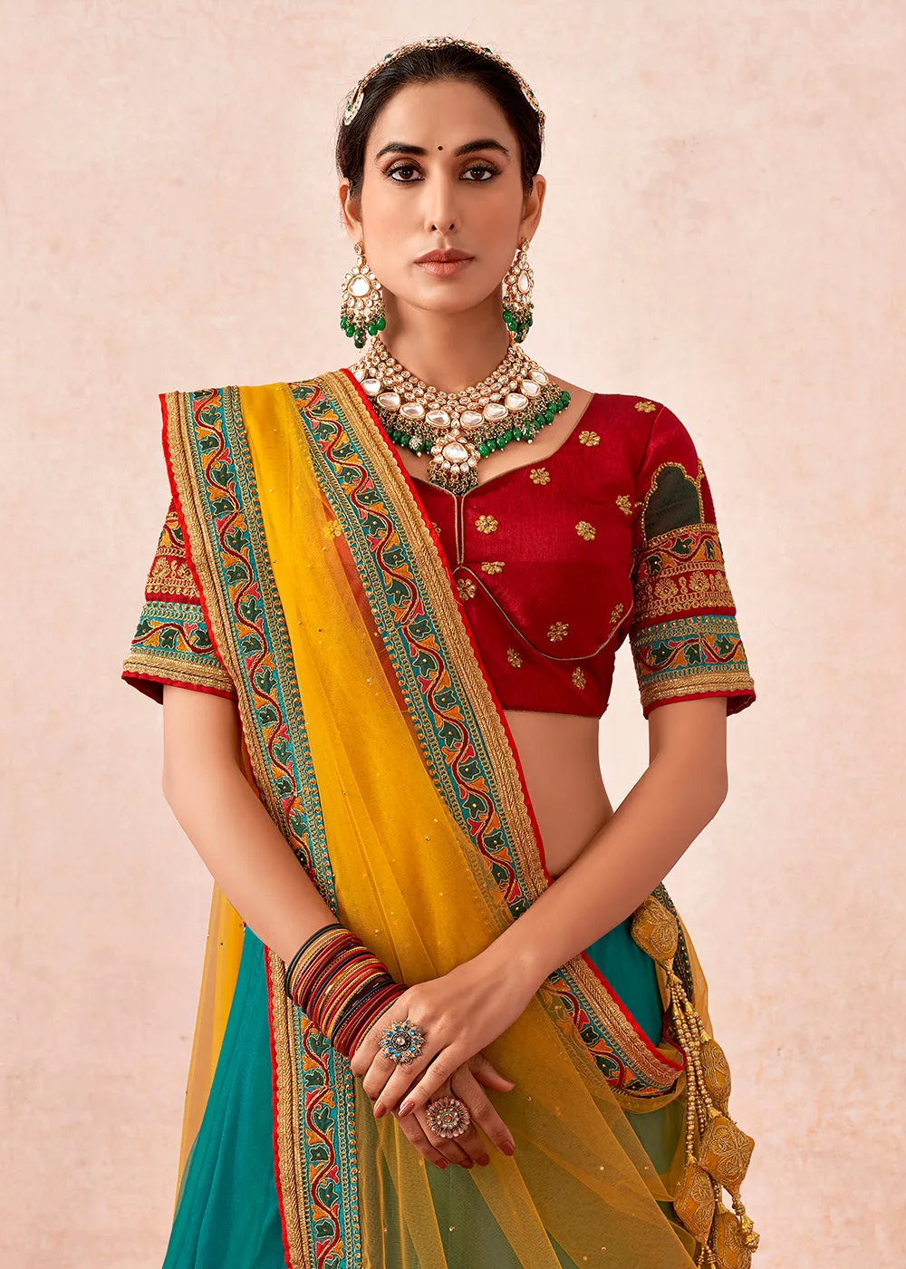 Traditional Turquoise & Maroon Kalidar Embroidered Net Lehenga Choli